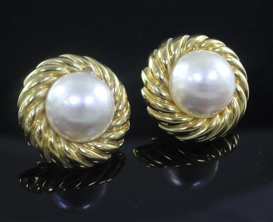 A pair of 18ct gold and mabe pearl circular earrings, retailed by David Morris, diameter 26mm.